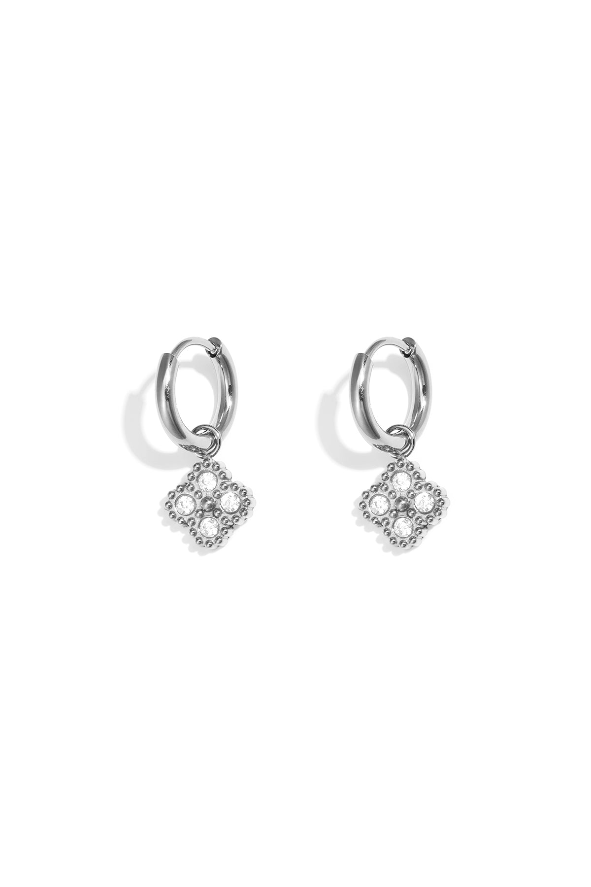 Small hoop earrings with zirconia-set clover charm