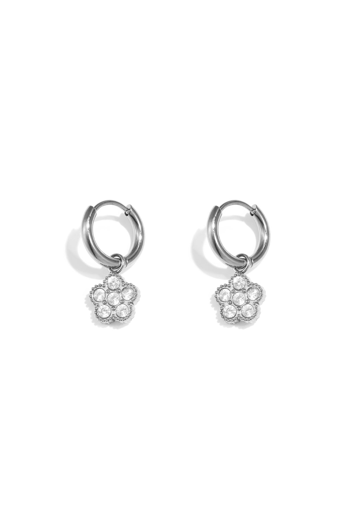 Small hoop earrings with hanging flowers made of zirconia stones