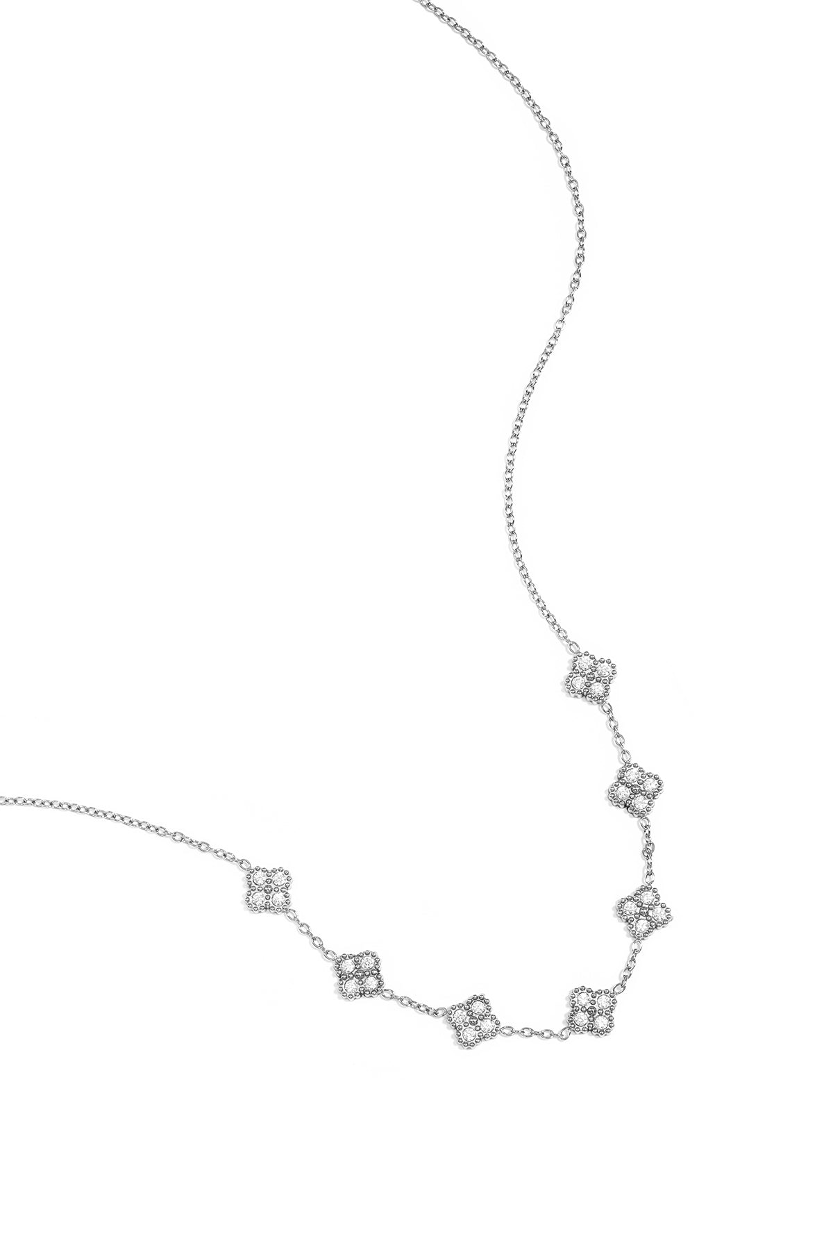 Necklace with zirconia-set clovers