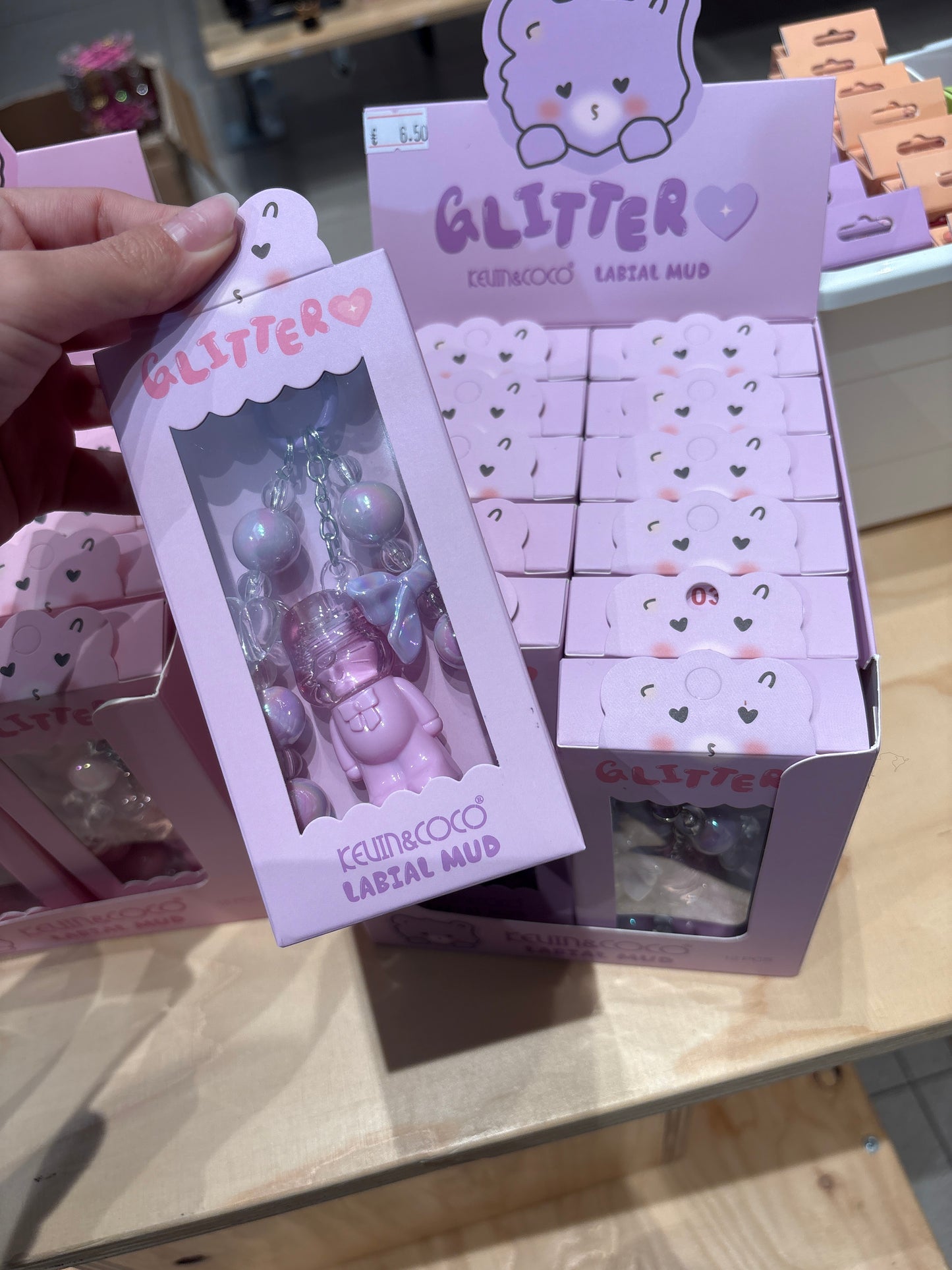 Purple lip gloss keychain